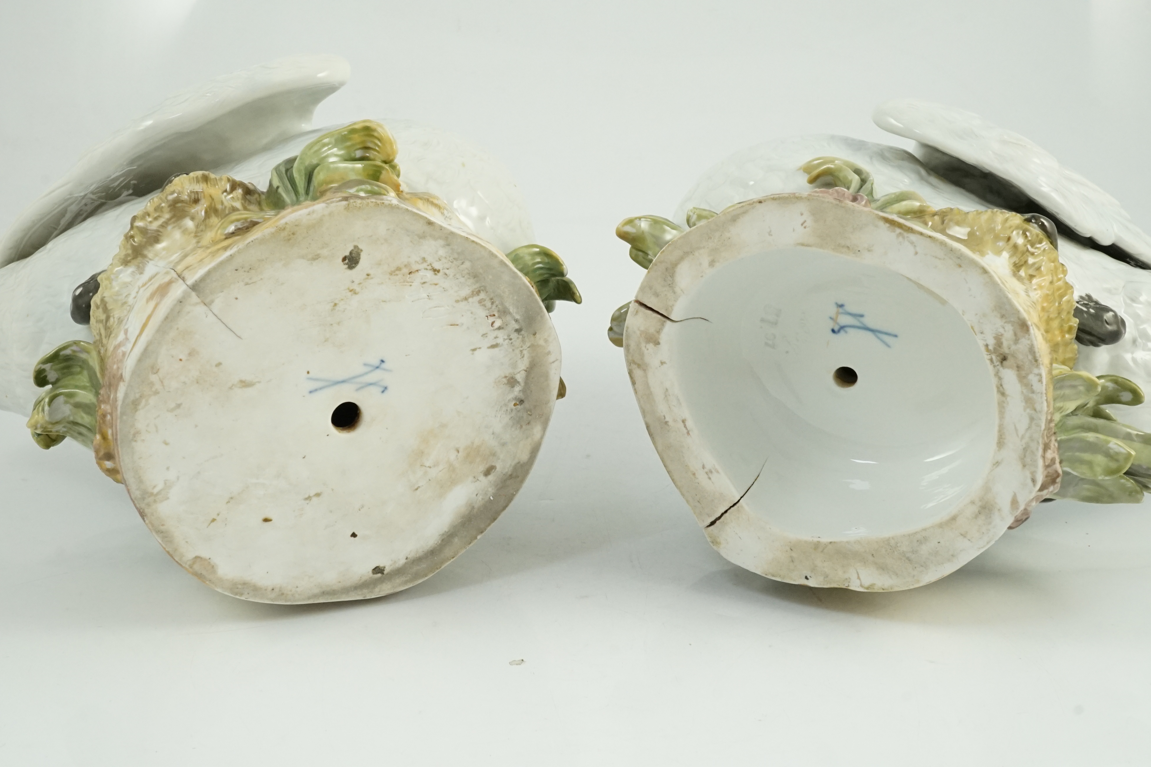 A pair of large Meissen models of swans, 19th century, one neck restored